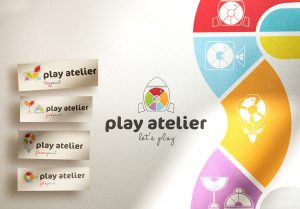 play atelier logo design